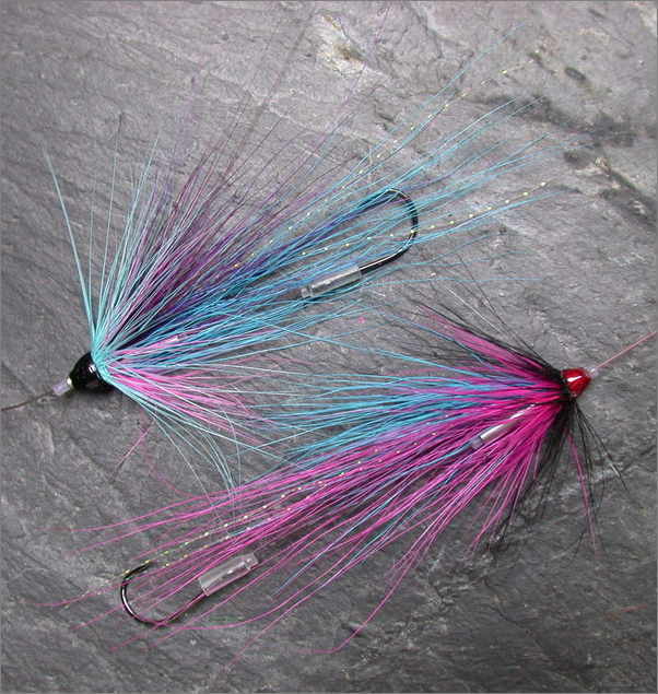 Tube flies with single hook and knotguard